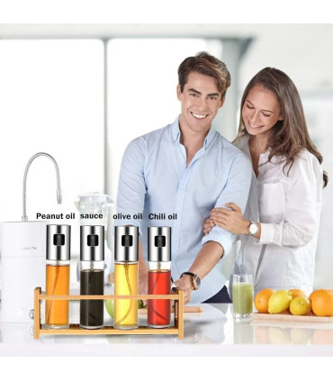 verre alimentaire, gril, friteuse à air, huile d'olive, salade, acier